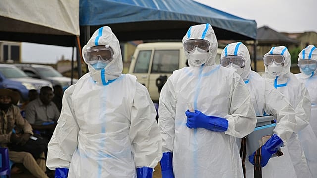 Nigeria steps up airport health screenings over Ebola fears Passengers arriving at Lagos airport queue for temperature…