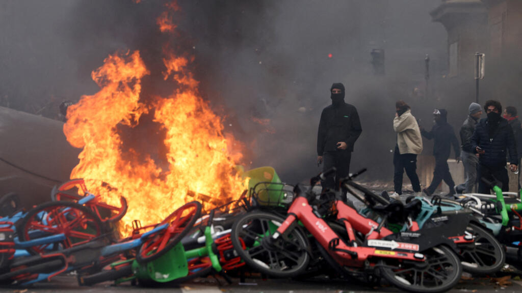 Live: Paris bans protests after violent unrest as Macron takes swipe at Trump French police banned protests in parts…