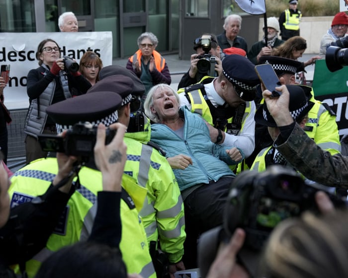 More than 100 protest against Palestine Action ban outside US embassy in London Police start arresting demonstrators…