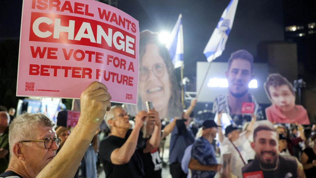 Thousands take to Tel Aviv's streets for protests against Netanyahu Thousands marched against Prime Minister Benjamin…