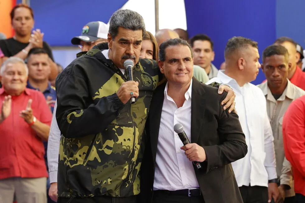 A businessman wanted in the U.S. for allegedly bribing top Venezuelan officials has been taken into custody.
