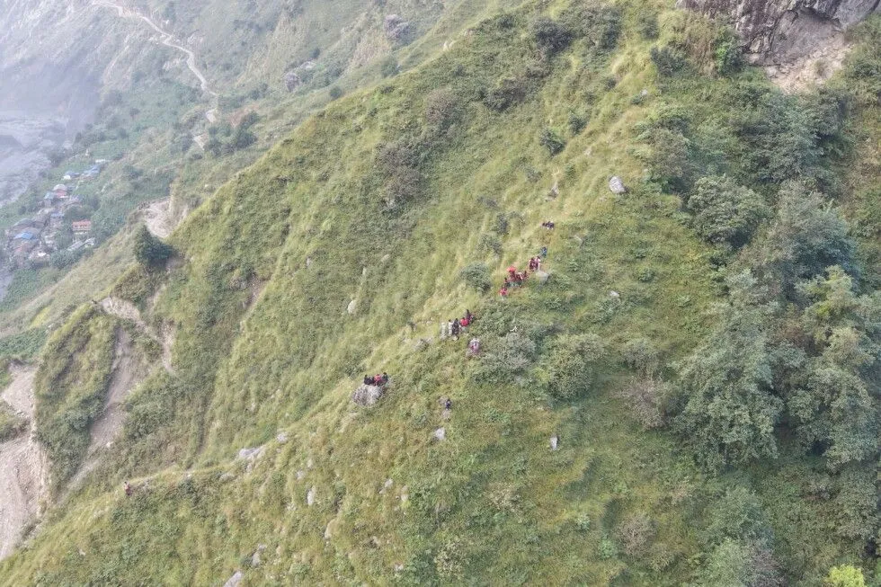 Rescuers from Nepal’s military on Monday reached an area hit by a flash flood the previous day. Helicopters and…