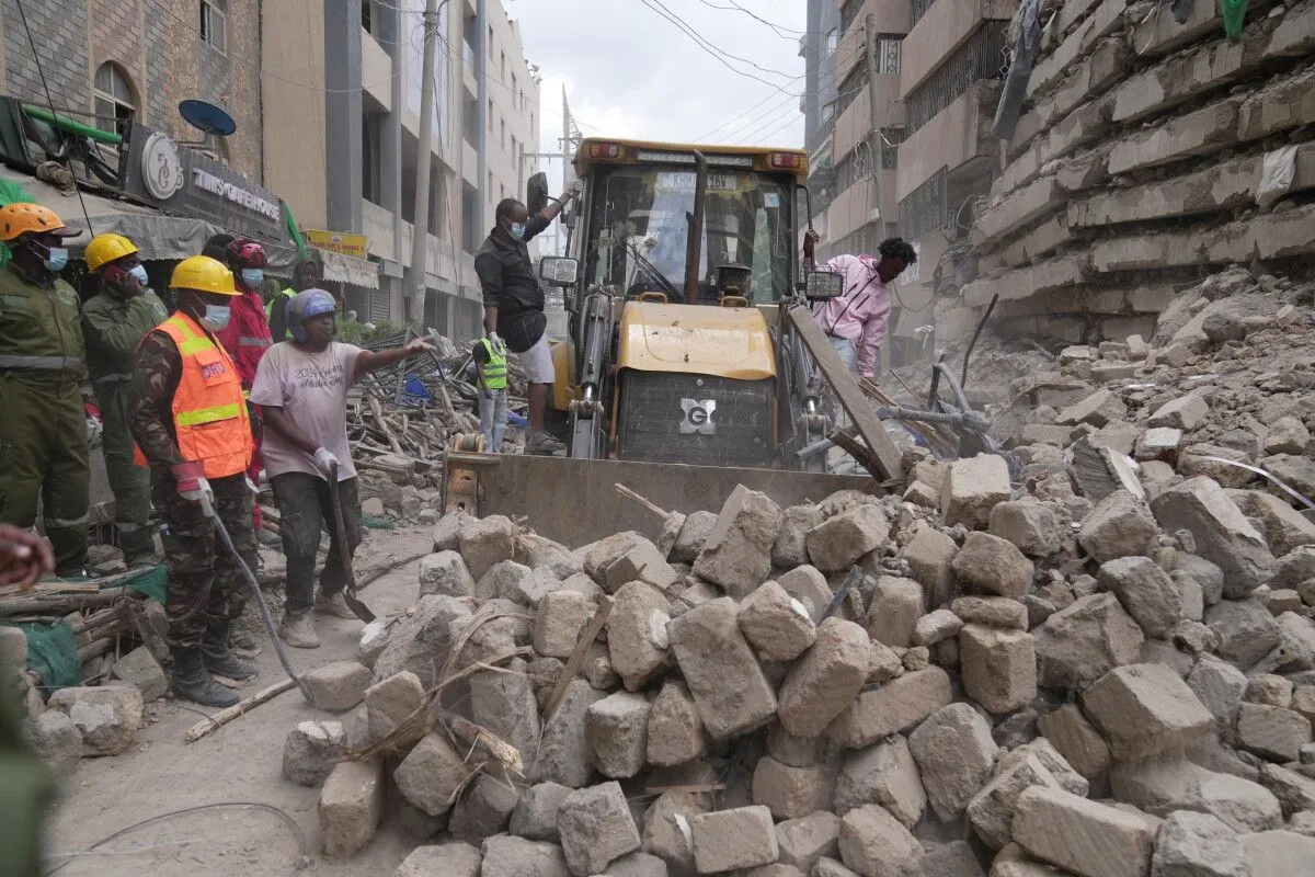 Four people have been pulled from a collapsed building in Kenya; others still trapped have spoken to relatives.