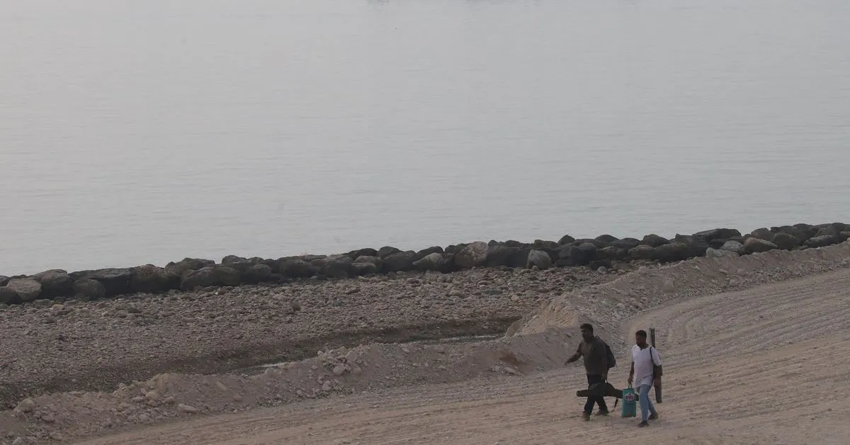 US jet disables cargo ship running Iran blockade; supertanker hits mine in Hormuz
