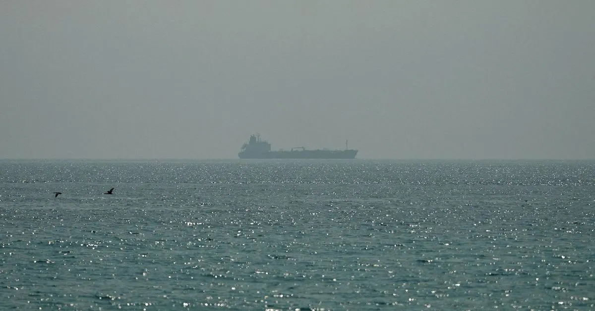 Iran's Guards hit tankers near Hormuz as oil flows through the strait collapse