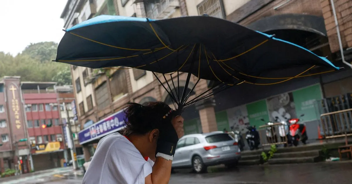 Typhoon Champi killed one person and injured more than 600 in Taiwan and southern Japan before weakening toward China's 