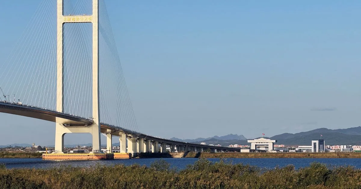 China-North Korea bridge to open on October 15 The ​long-delayed New Yalu River Bridge linking ‌China and North Korea…