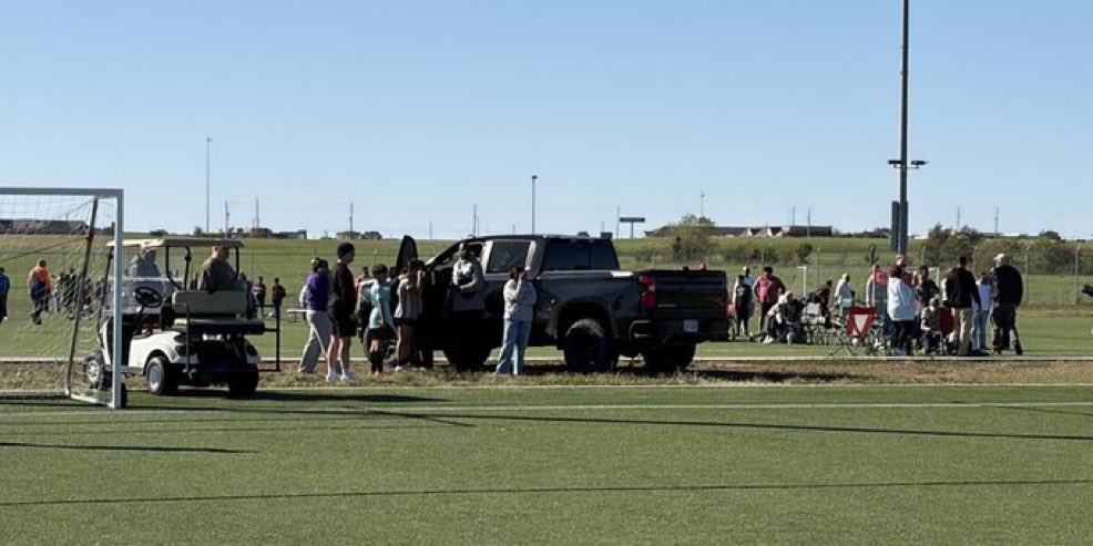 A pickup drove through a youth soccer game in Wichita, Kansas, killing a child and an adult; the driver is in custody.