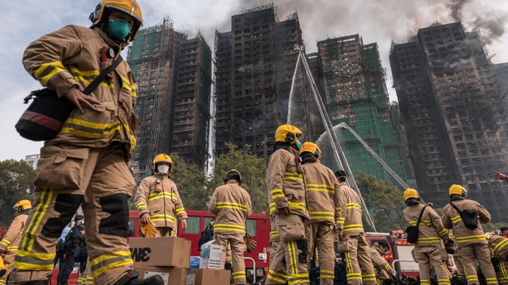 Hong Kong leader apologises and housing minister resigns after fire investigation exposes failures Hong Kong Chief…