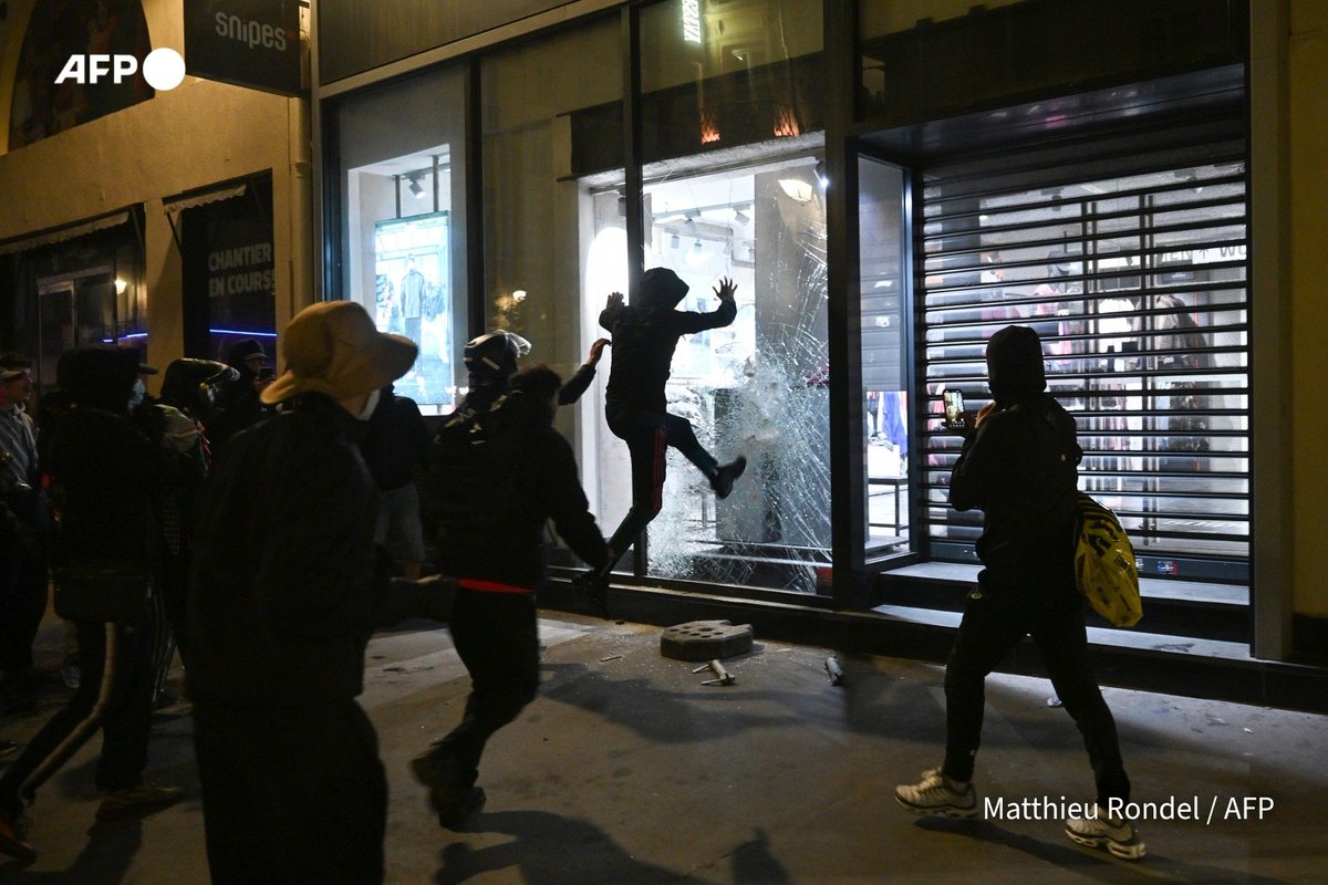 Macron keeps interior minister as France orders local curfews after worst riots in years